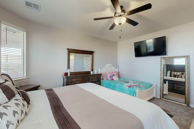 bedroom featuring light carpet and ceiling fan