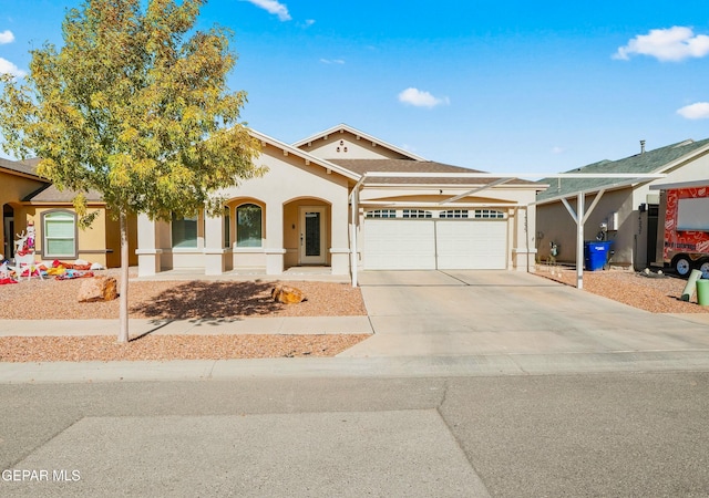 view of front facade with covered porch and a garage