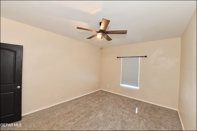 empty room with carpet floors and ceiling fan