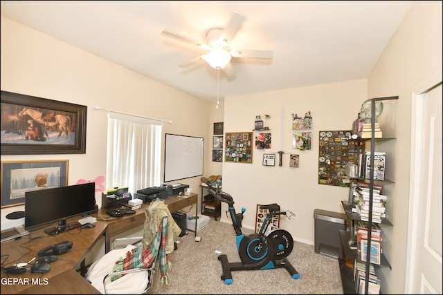 office with carpet flooring and ceiling fan