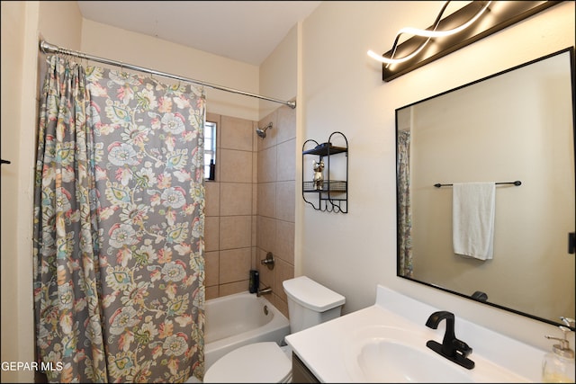 full bathroom with vanity, shower / bathtub combination with curtain, and toilet