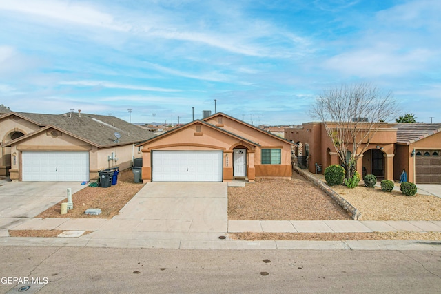 single story home with a garage