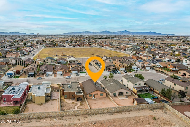 bird's eye view featuring a residential view and a mountain view