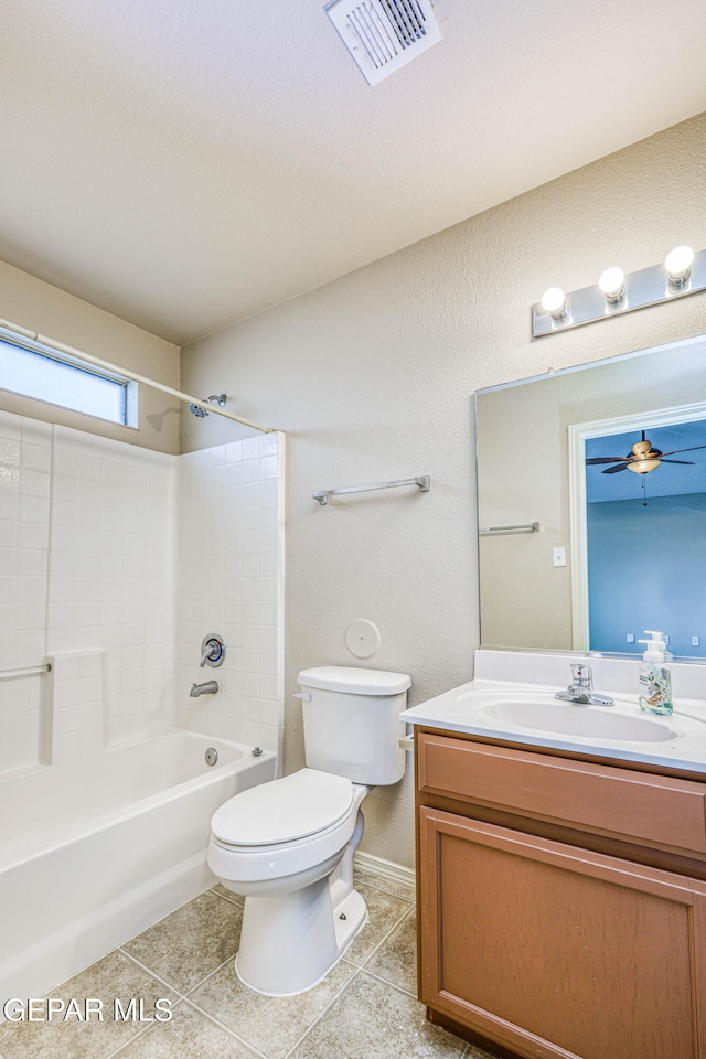 full bathroom with visible vents, toilet, tile patterned flooring, vanity, and shower / bathing tub combination