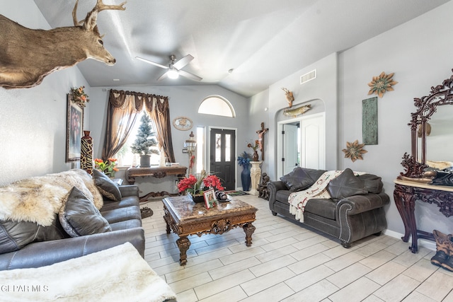 living room with vaulted ceiling and ceiling fan