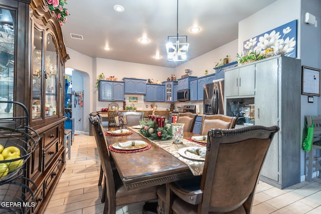 dining area with light hardwood / wood-style flooring