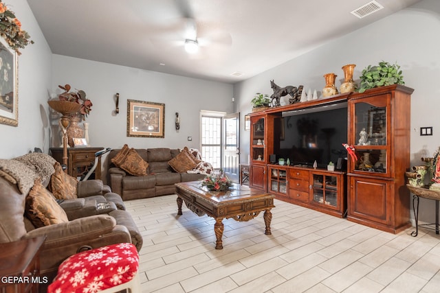 living room featuring ceiling fan