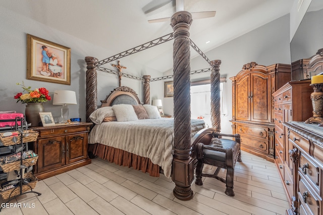 bedroom with light wood-type flooring, ceiling fan, and lofted ceiling