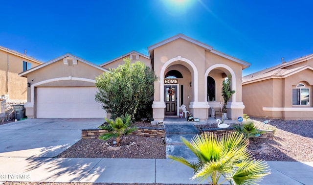 view of front of home with a garage