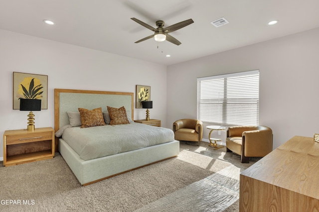 carpeted bedroom with ceiling fan