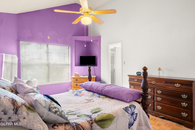 bedroom with ceiling fan, high vaulted ceiling, and light parquet flooring