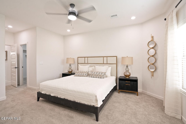 carpeted bedroom featuring ceiling fan