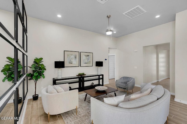 living room featuring ceiling fan