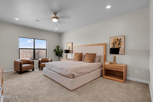 carpeted bedroom with ceiling fan