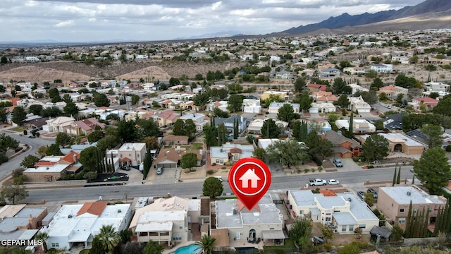 drone / aerial view featuring a mountain view