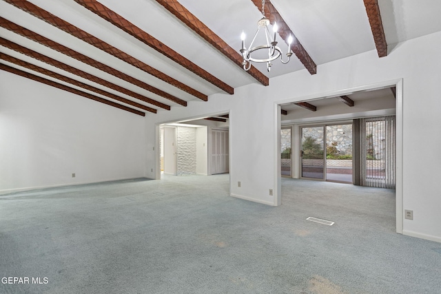 unfurnished living room featuring a notable chandelier, beam ceiling, and light colored carpet