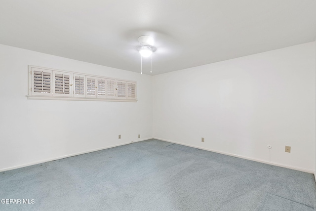 unfurnished room featuring carpet floors