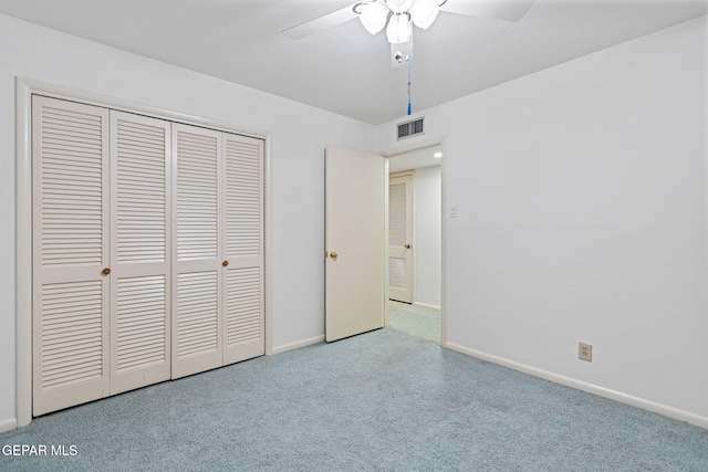 unfurnished bedroom featuring a closet and ceiling fan