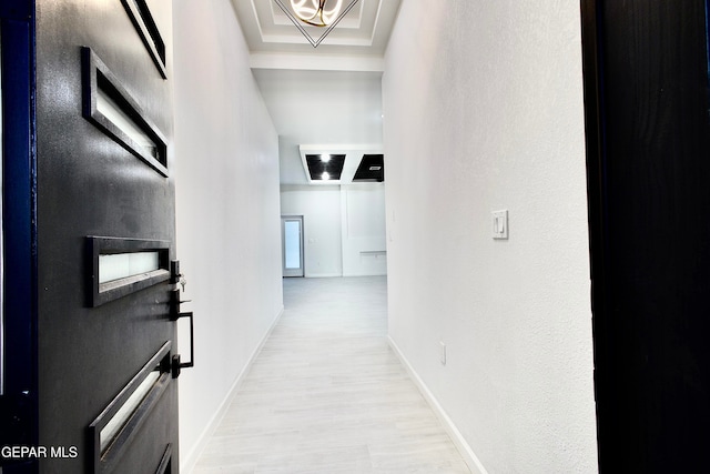 hallway with light wood-type flooring