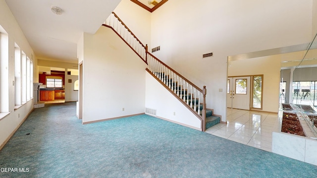 view of carpeted foyer