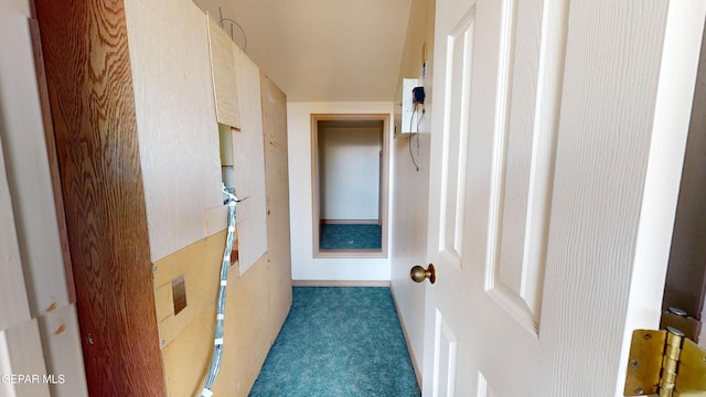 hall with dark carpet