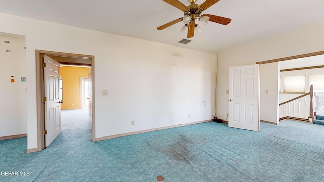 unfurnished bedroom featuring carpet flooring and ceiling fan