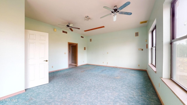 interior space featuring ceiling fan