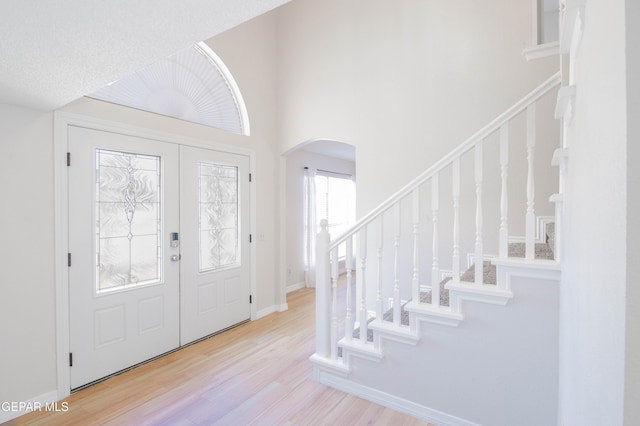 foyer with light hardwood / wood-style flooring