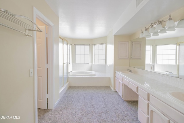 bathroom featuring vanity and plus walk in shower