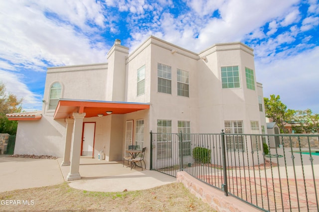 view of front facade featuring a patio area