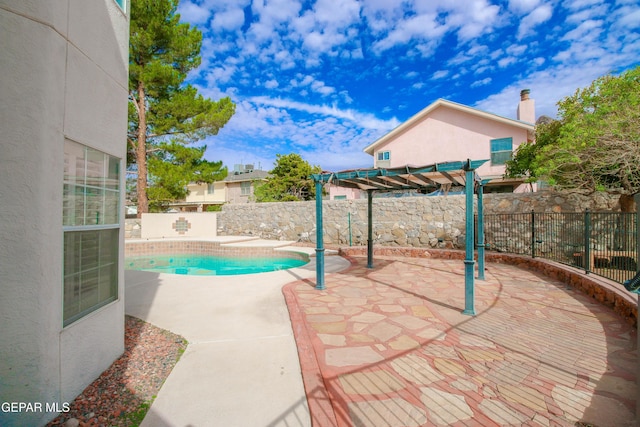 view of patio with a pergola and a fenced in pool