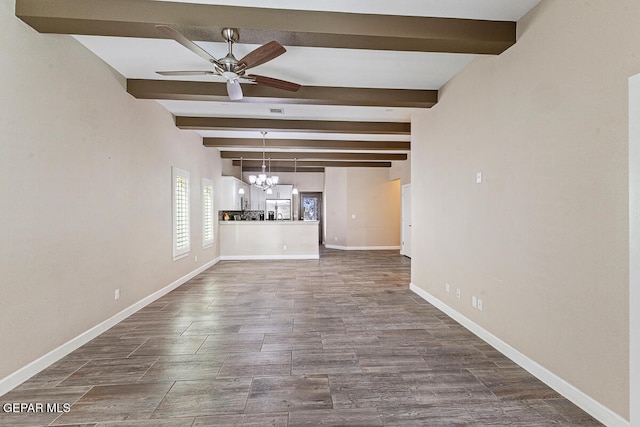 unfurnished living room featuring beamed ceiling, ceiling fan with notable chandelier, and hardwood / wood-style flooring