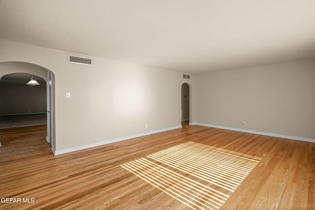 empty room featuring hardwood / wood-style floors