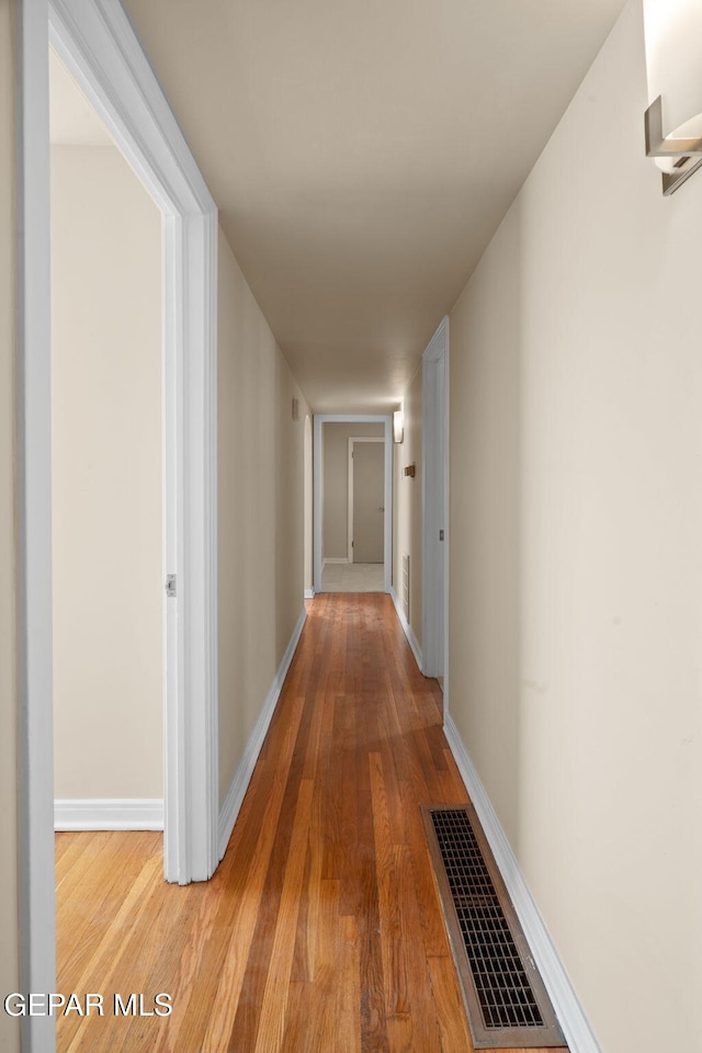 hall featuring hardwood / wood-style flooring