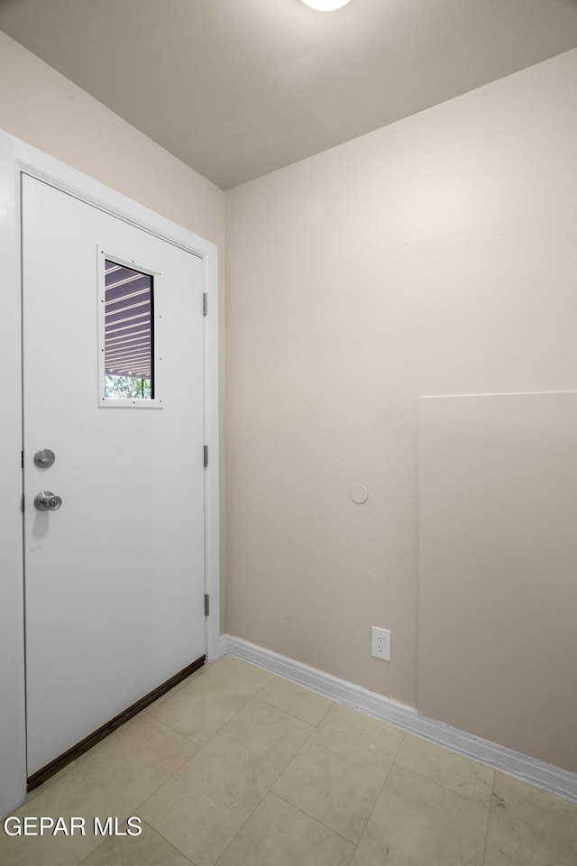 interior space featuring light tile patterned floors