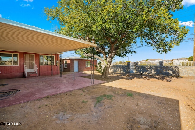 view of yard featuring a patio area