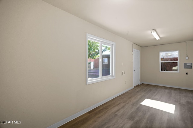 empty room with wood-type flooring