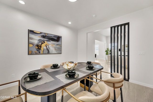 dining area featuring light hardwood / wood-style floors