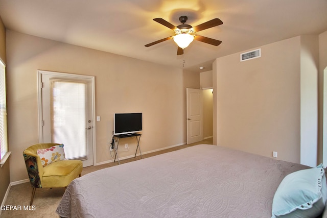 carpeted bedroom featuring ceiling fan