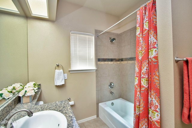 bathroom with sink and shower / tub combo with curtain