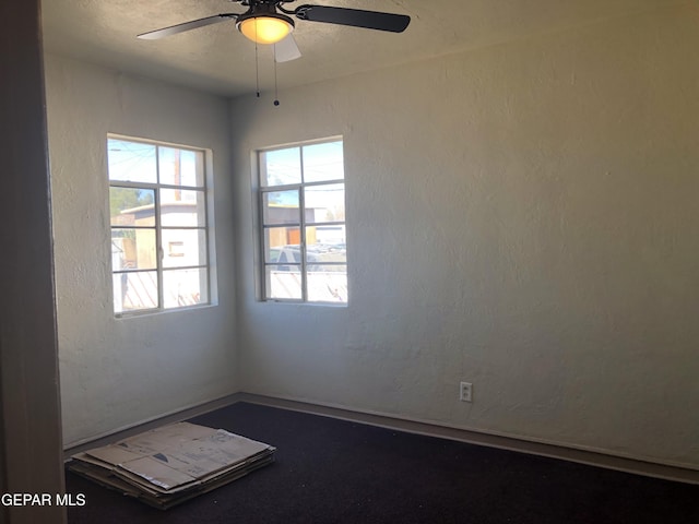 unfurnished room featuring ceiling fan