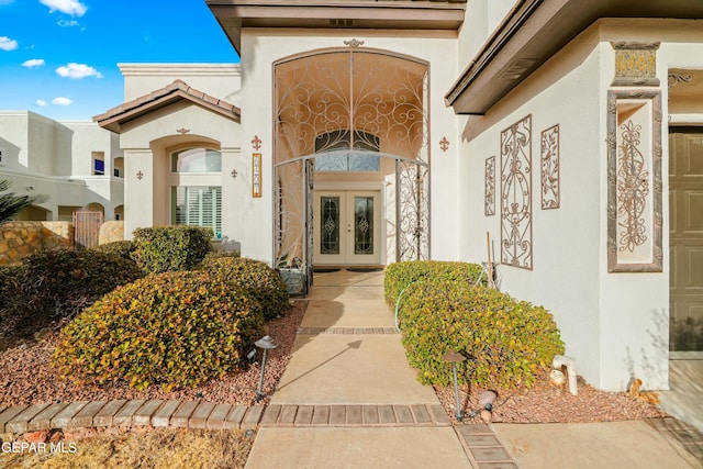 doorway to property with french doors