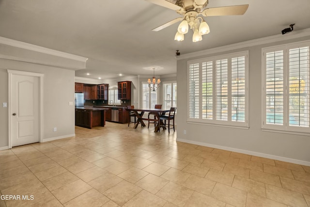 dining room featuring ceiling fan with notable chandelier, light tile patterned flooring, and ornamental molding