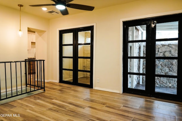2406 Lebanon Rear, Rear, El Paso, TX 79930 - foyer with ceiling fan, wood finished floors, and baseboards