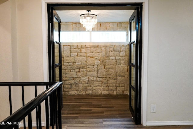 2406 Lebanon Rear, Rear, El Paso, TX 79930 - corridor with a chandelier, wood finished floors, and baseboards
