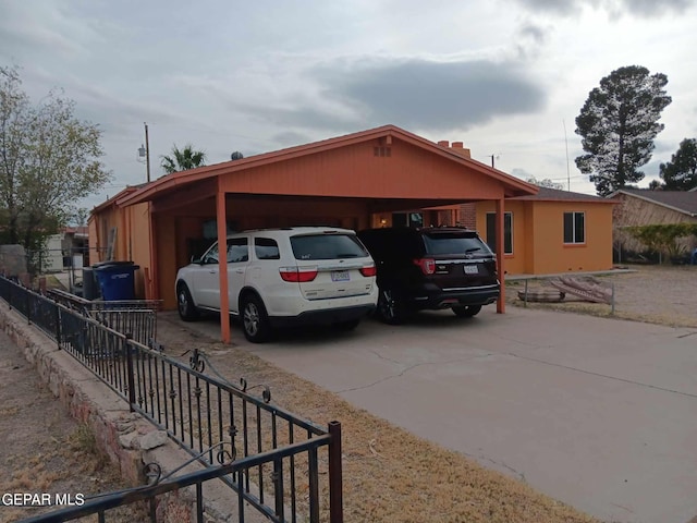 view of front of property with a carport