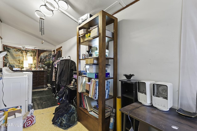 storage area featuring independent washer and dryer