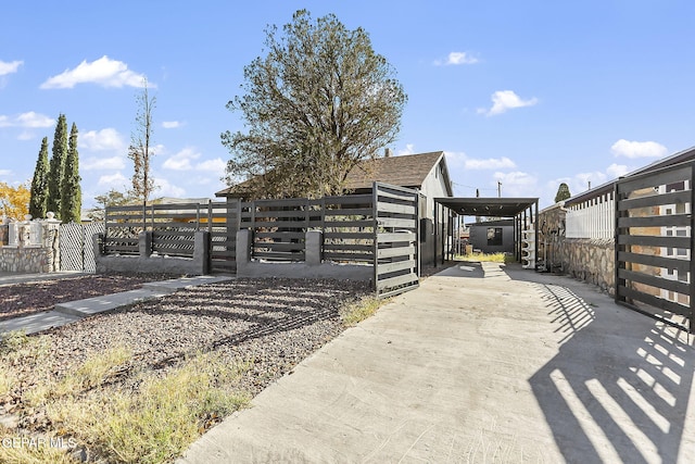 exterior space featuring a carport