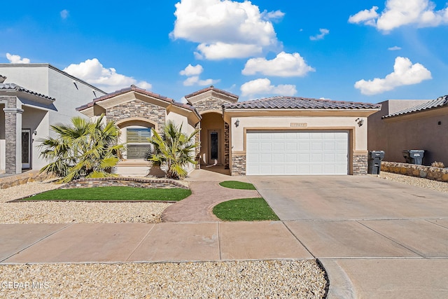 mediterranean / spanish-style house featuring a garage