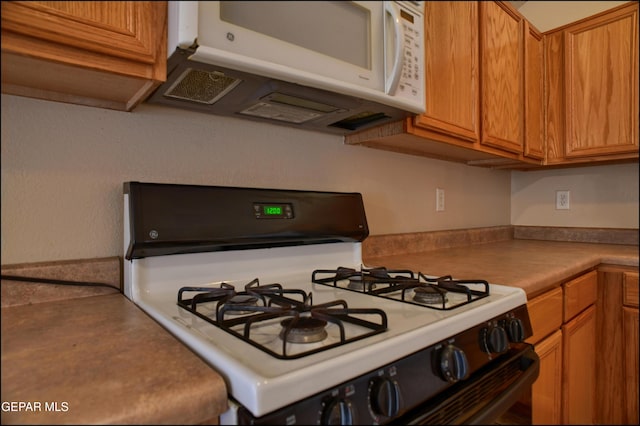 kitchen with white appliances